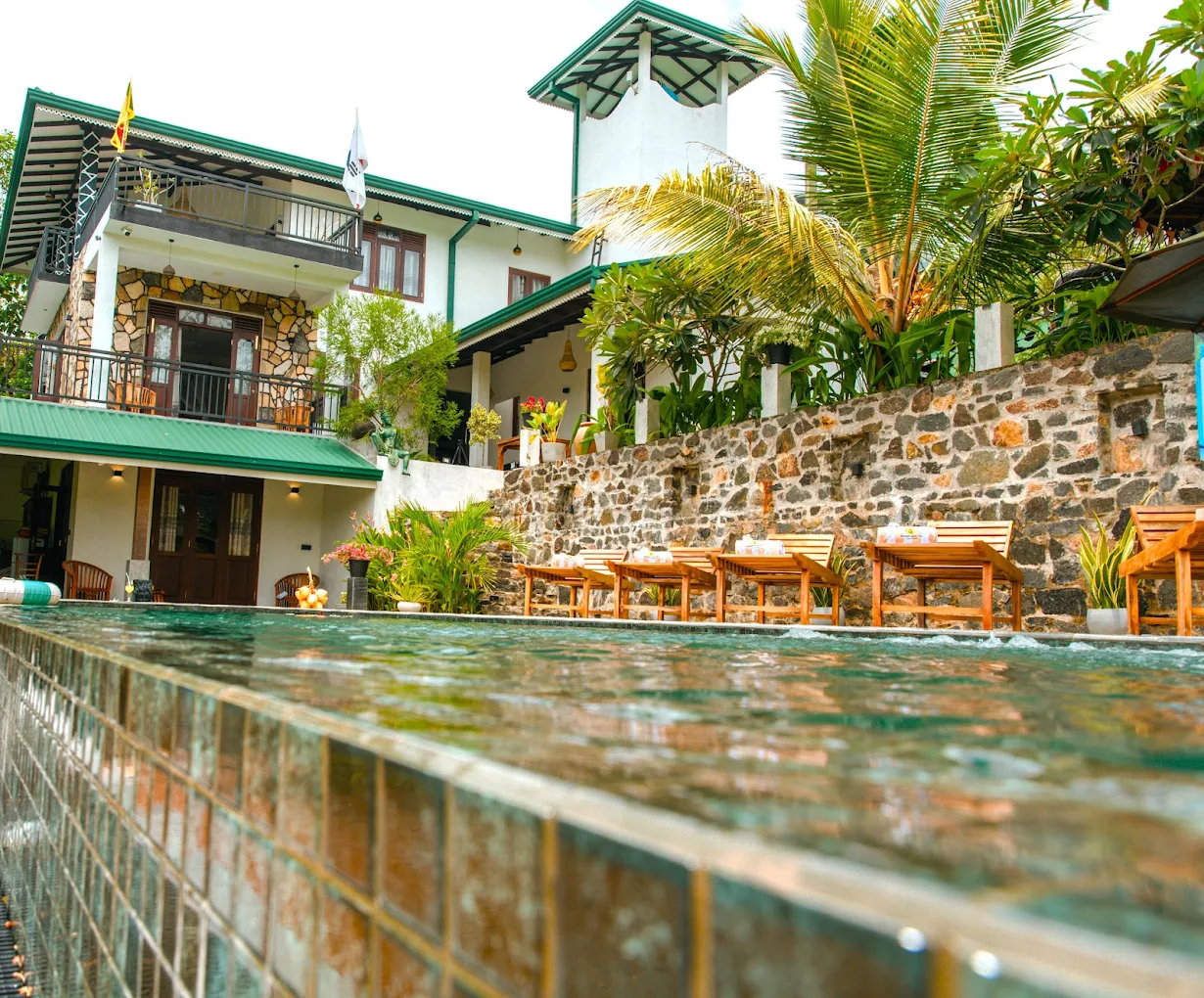 Monkey Island Villa and swimming pool surrounded by tropical greenery